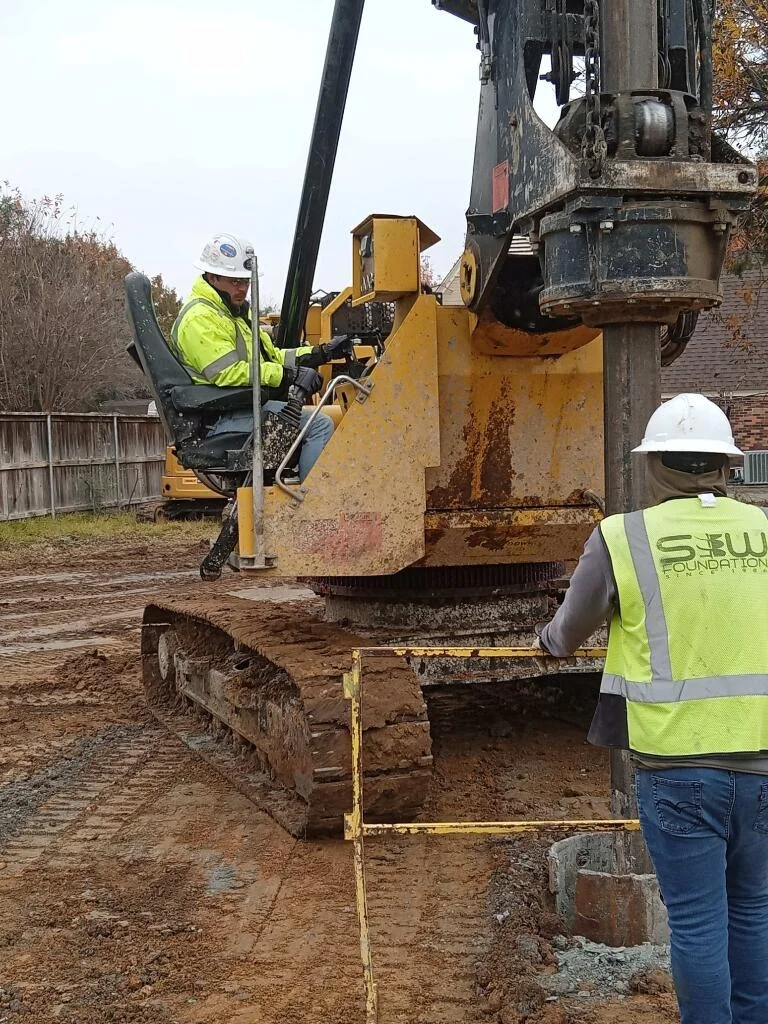 S&W Crew Safely Drilling Holes as Foundation Contractor on a Commercial Construction Jobsite